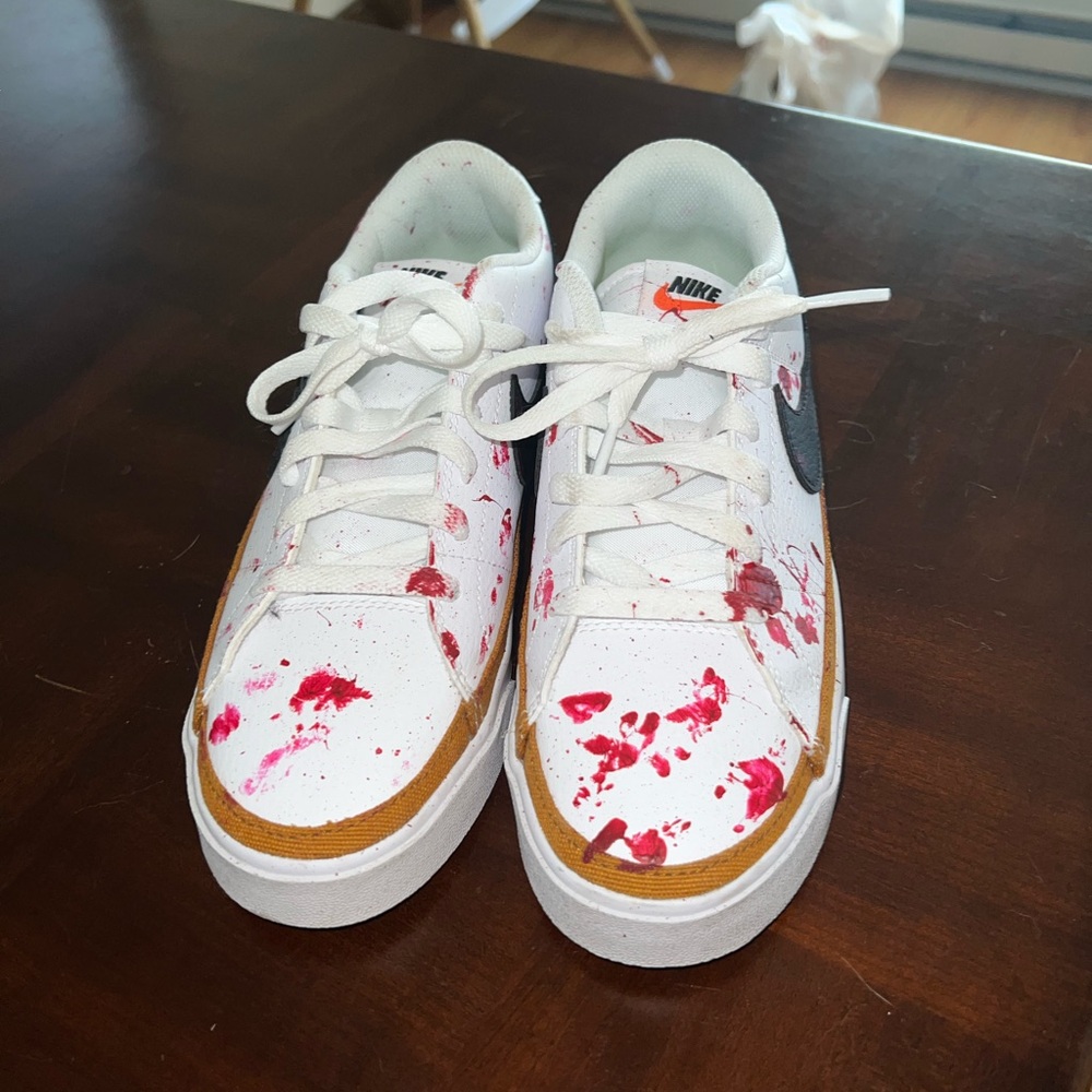 Nike shoes used for my gender reveal hint the pink paintThere a size 8 women’s